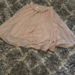 Pink skirt with light gold polka dots